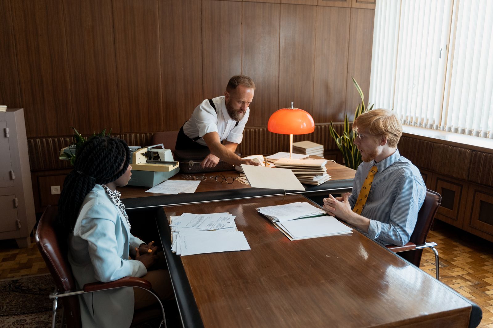Team reviewing information and documents in an office